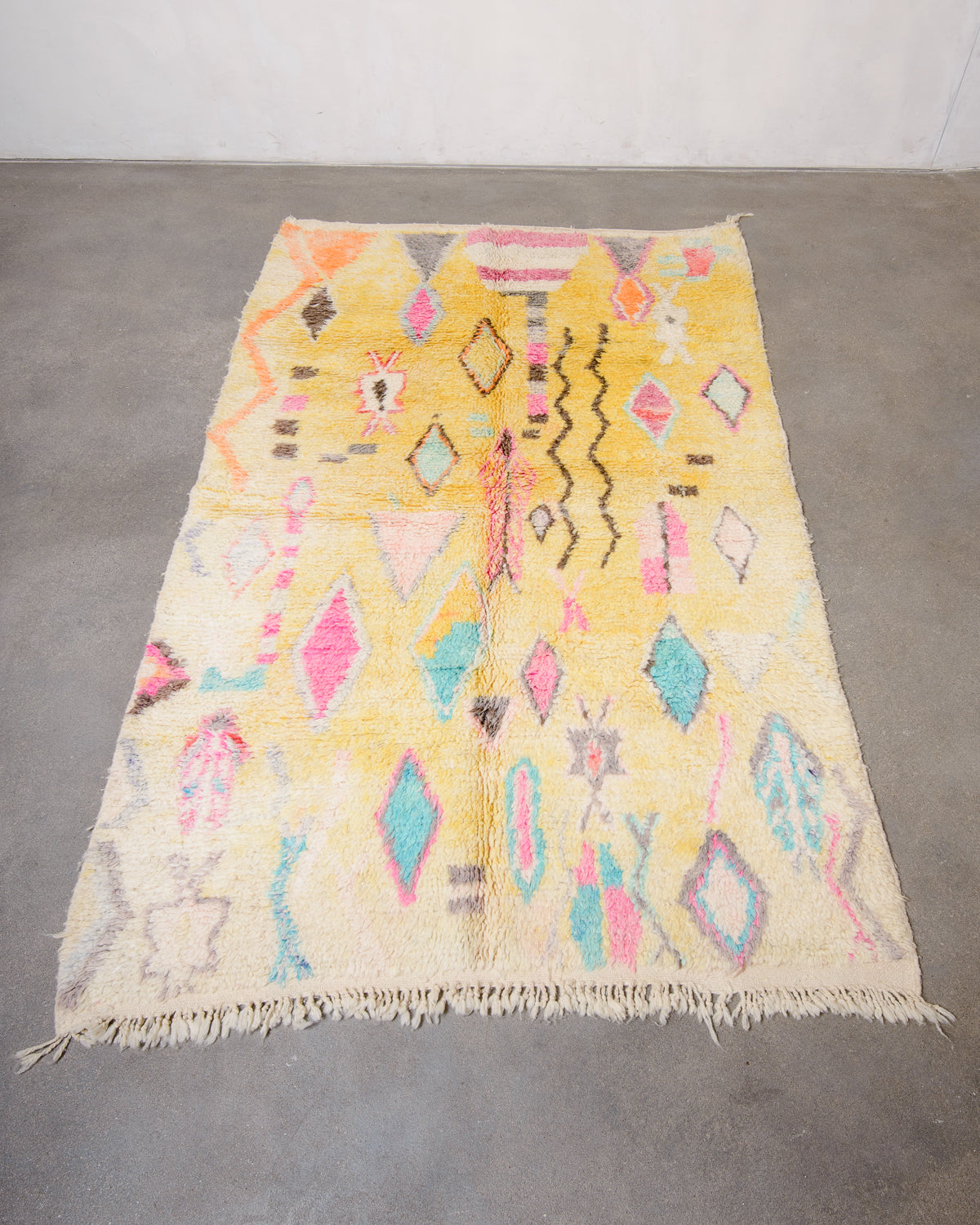 Modern, designer, handcrafted Berber rug from Morocco. Vintage carpet with beautiful colours and patterns and fluffy texture.